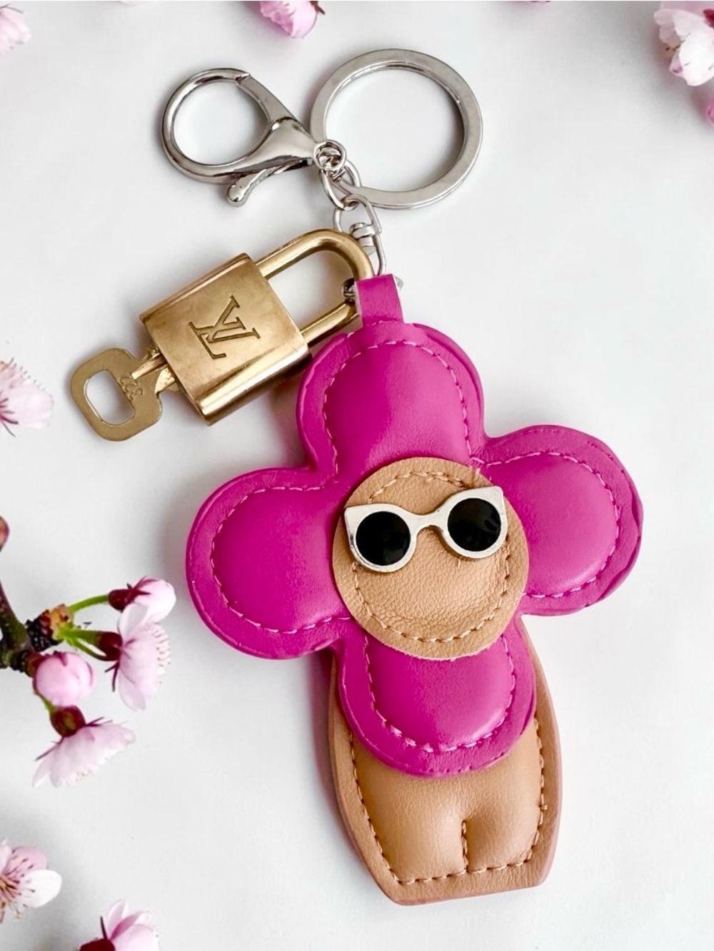 Louis Vuitton padlock with unbranded bag charm